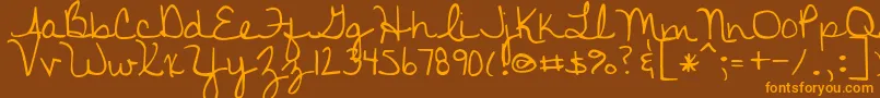 DiscoverBeauty Font – Orange Fonts on Brown Background