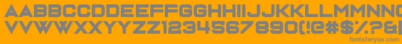 Dispence-fontti – harmaat kirjasimet oranssilla taustalla
