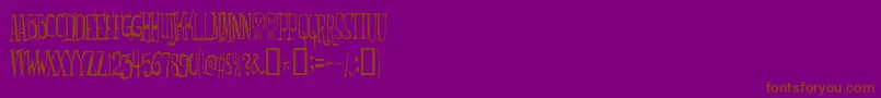 Więcej informacji o czcionce Monsterfreak Czcionka Monsterfreak – brązowe czcionki na fioletowym tle