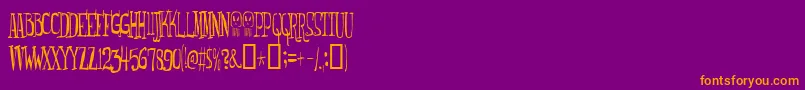 Monsterfreak-Schriftart – Orangefarbene Schriften auf violettem Hintergrund