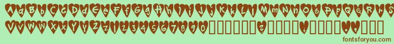 Fonte Djellibejbi – fontes marrons em um fundo verde