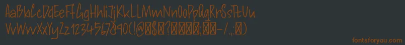 DK Andorra Script Font – Brown Fonts on Black Background