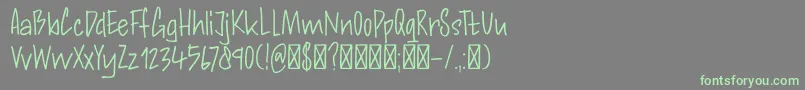 More about DK Andorra Script Font DK Andorra Script Font – Green Fonts on Gray Background