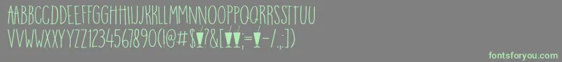Шрифт DK Mango Smoothie – зелёные шрифты на сером фоне