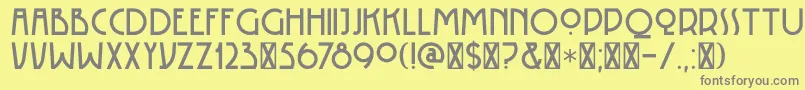 DK Rotorua-fontti – harmaat kirjasimet keltaisella taustalla