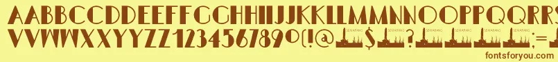 フォントDK Semarang Kolonial – 茶色の文字が黄色の背景にあります。