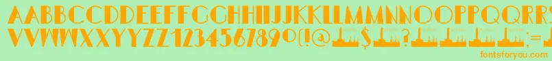 フォントDK Semarang Kolonial – オレンジの文字が緑の背景にあります。