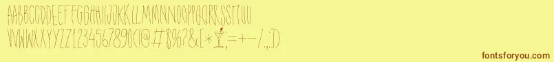 DK Shaken Not Stirred Font – Brown Fonts on Yellow Background
