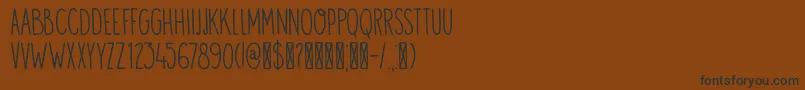 Weitere Informationen zur DK Visum-Schriftart DK Visum-Schriftart – Schwarze Schriften auf braunem Hintergrund
