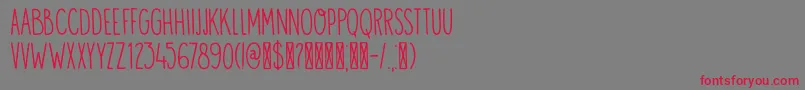 フォントDK Visum – 赤い文字の灰色の背景