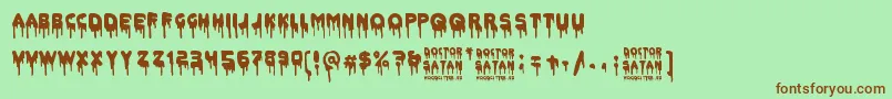 Doctor Satan-Schriftart – Braune Schriften auf grünem Hintergrund