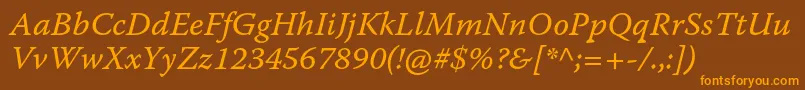 WarnockproItcapt-fontti – oranssit fontit ruskealla taustalla