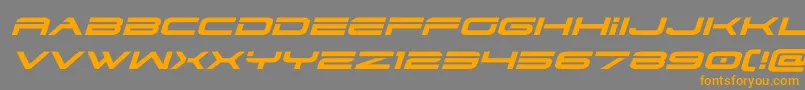 フォントdodger3 1expandital – オレンジの文字は灰色の背景にあります。