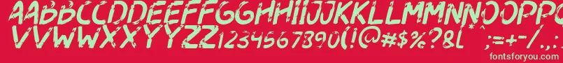 Fonte Dogfight Italic – fontes verdes em um fundo vermelho