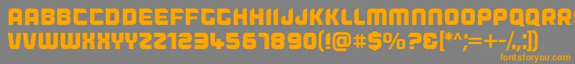 フォントDogfish – オレンジの文字は灰色の背景にあります。