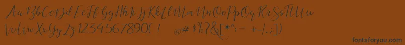 dogma demo Font – Black Fonts on Brown Background