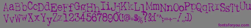 Czcionka SaInkspot – fioletowe czcionki na szarym tle
