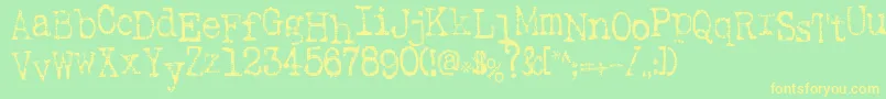 フォントSaInkspot – 黄色の文字が緑の背景にあります