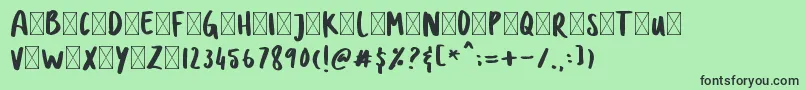 Шрифт DOLANAN – чёрные шрифты на зелёном фоне