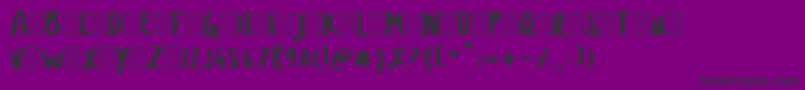 フォントDOLANAN – 紫の背景に黒い文字