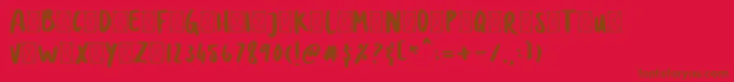 DOLANAN-Schriftart – Braune Schriften auf rotem Hintergrund