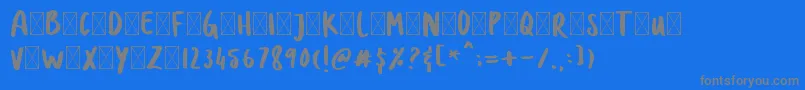 DOLANAN-Schriftart – Graue Schriften auf blauem Hintergrund