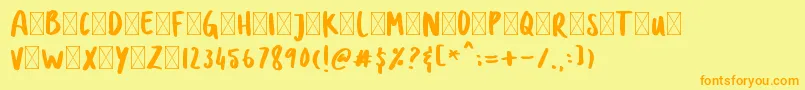 フォントDOLANAN – オレンジの文字が黄色の背景にあります。