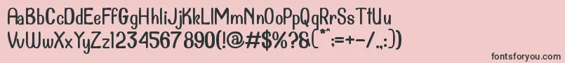 フォントDollanan 2 – ピンクの背景に黒い文字