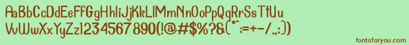 Dollanan 2-fontti – ruskeat fontit vihreällä taustalla