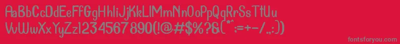 フォントDollanan 2 – 赤い背景に灰色の文字