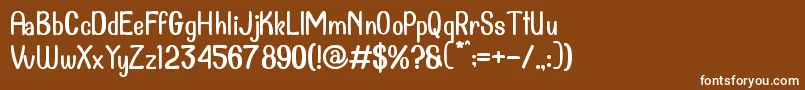 Dollanan 2-fontti – valkoiset fontit ruskealla taustalla