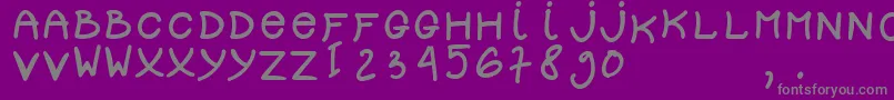 フォントdolly – 紫の背景に灰色の文字