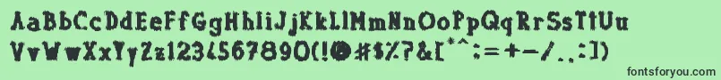 Шрифт Dolor de Muelas – чёрные шрифты на зелёном фоне