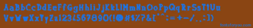 Dolor de Muelas-fontti – siniset fontit ruskealla taustalla