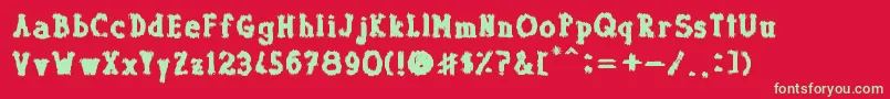 フォントDolor de Muelas – 赤い背景に緑の文字