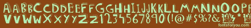 フォントDOLORES – 緑色の文字が茶色の背景にあります。