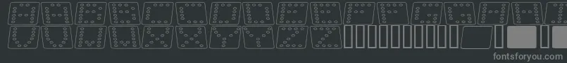 Fonte Dom flko – fontes cinzas em um fundo preto