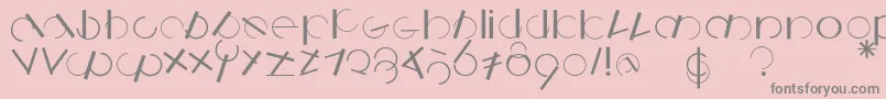 フォントLogomatique – ピンクの背景に灰色の文字