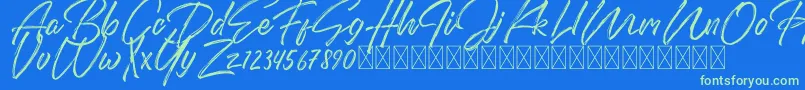 DomillionBrushFree-Schriftart – Grüne Schriften auf blauem Hintergrund