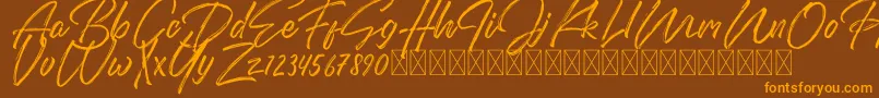 DomillionBrushFree-Schriftart – Orangefarbene Schriften auf braunem Hintergrund