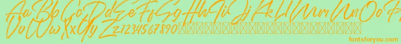 DomillionBrushFree-Schriftart – Orangefarbene Schriften auf grünem Hintergrund