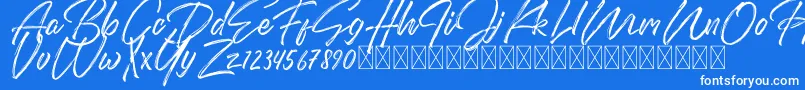 DomillionBrushFree-Schriftart – Weiße Schriften auf blauem Hintergrund