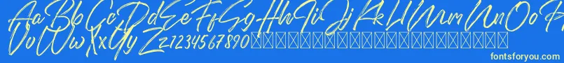 DomillionBrushFree-Schriftart – Gelbe Schriften auf blauem Hintergrund