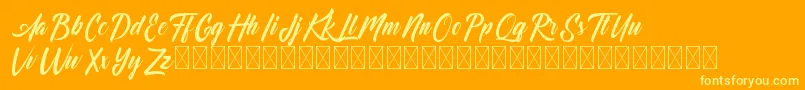 フォントDominick – オレンジの背景に黄色の文字