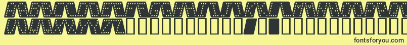 Domino k Font – Black Fonts on Yellow Background