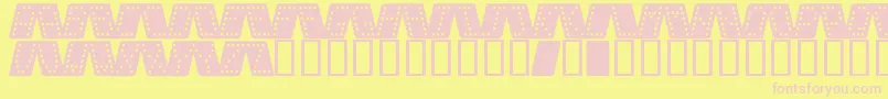 Domino k Font – Pink Fonts on Yellow Background