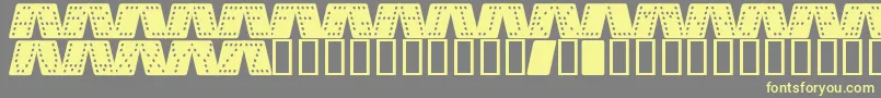 Domino k Font – Yellow Fonts on Gray Background