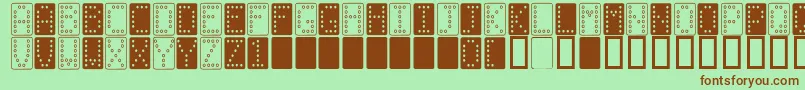 フォントDomino n – 緑の背景に茶色のフォント