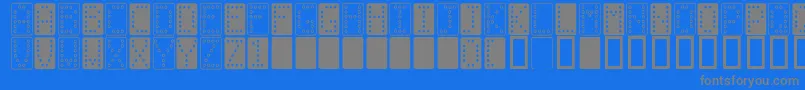 Domino n-fontti – harmaat kirjasimet sinisellä taustalla