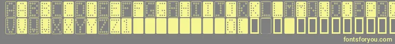 Domino n-fontti – keltaiset fontit harmaalla taustalla